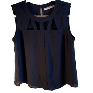 Forever 21 sleeveless black top with cutouts. Size Medium